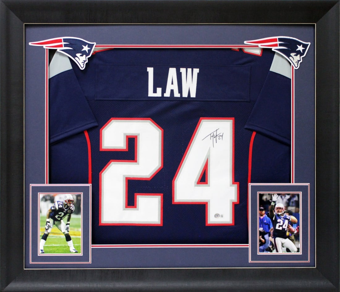 Framed New England Patriots Jersey Signed by Ty Law with Beckett COA: Framed New England Patriots Jersey Signed by Ty Law with Beckett COA This navy blue pro style framed jersey has been personally signed by Ty Law of the New England Patriots. The autograph is authentic