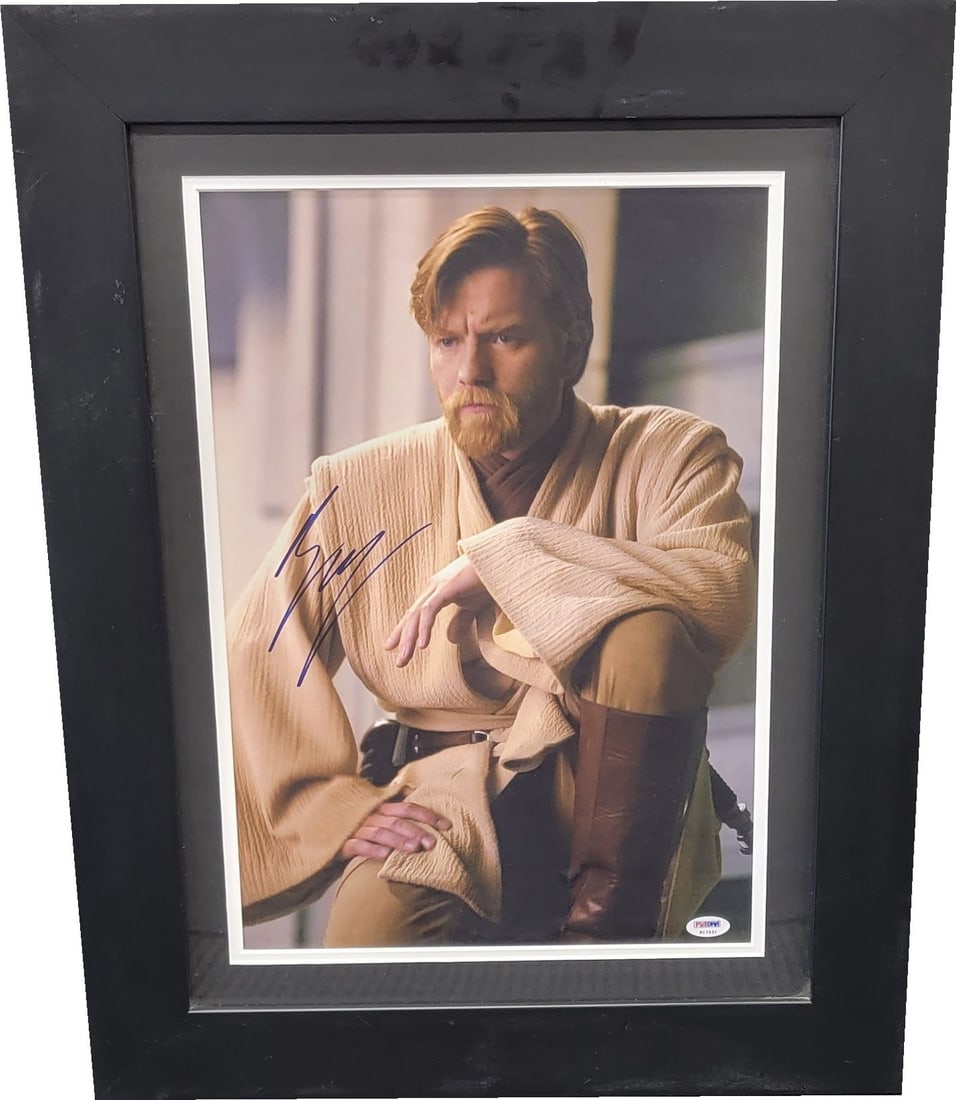 PSA DNA Framed Ewan McGregor Autographed Photo Star Wars Phantom Menace: PSA DNA Framed Ewan McGregor Autographed Photo Star Wars Phantom Menace This is a framed photograph featuring Ewan McGregor, autographed and authenticated by Professional Sports (PSA/DNA). The photo c