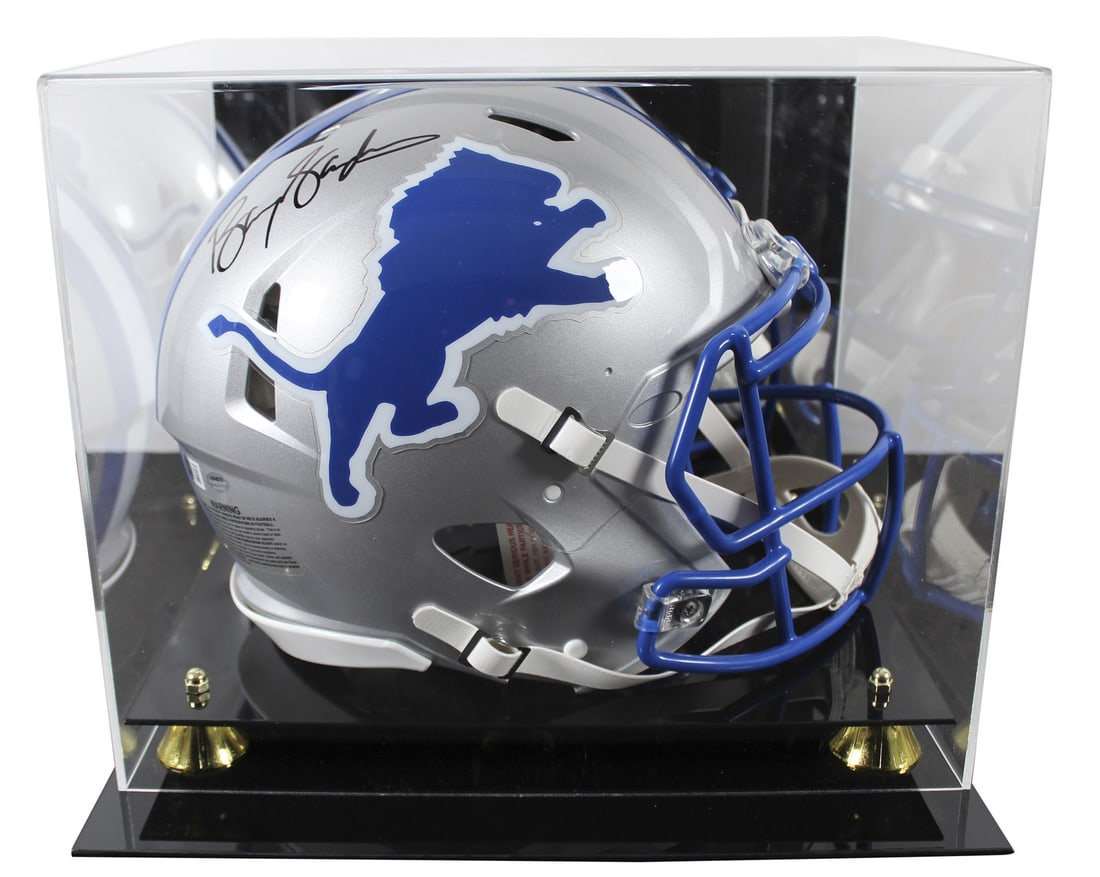 Barry Sanders autographed Detroit Lions Speed Proline helmet Beckett case: Barry Sanders autographed Detroit Lions Speed Proline helmet Beckett case This is a Detroit Lions throwback Speed Full Size Speed Proline helmet, personally signed by Barry Sanders. The helmet feature