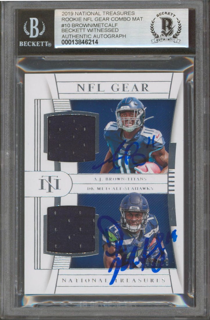 2019 National Treasures Rookie Combo Card Signed by D.K. Metcalf and A.J. Brown BAS 10: 2019 National Treasures Rookie Combo Card Signed by D.K. Metcalf and A.J. Brown BAS 10 This 2019 National Treasures Rookie NFL Gear Combo Materials #10 card features the authentic signatures of D.K. M