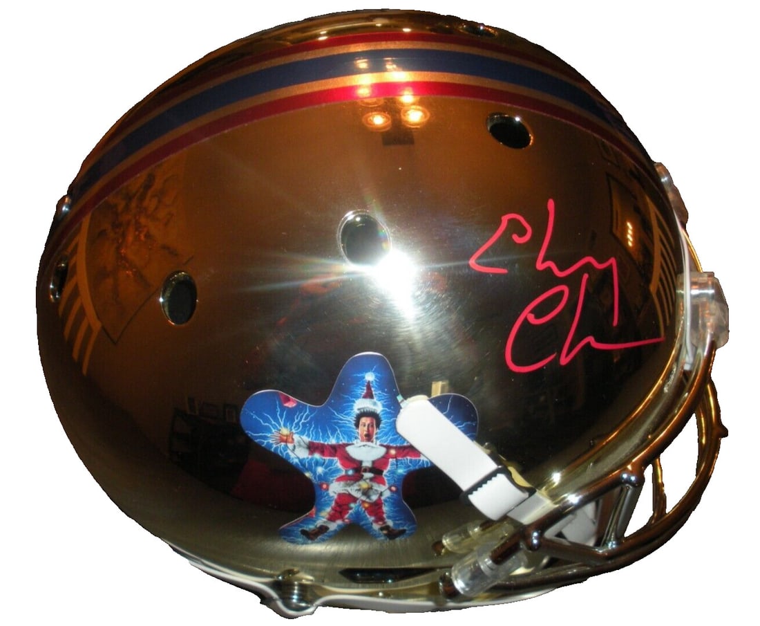 Chevy Chase Signed Full Size Christmas Vacation Replica Helmet Beckett COA: Chevy Chase Signed Full Size Christmas Vacation Replica Helmet Beckett COA This is a full-size replica helmet signed by Chevy Chase, known for his role in "Christmas Vacation." The helmet comes with a