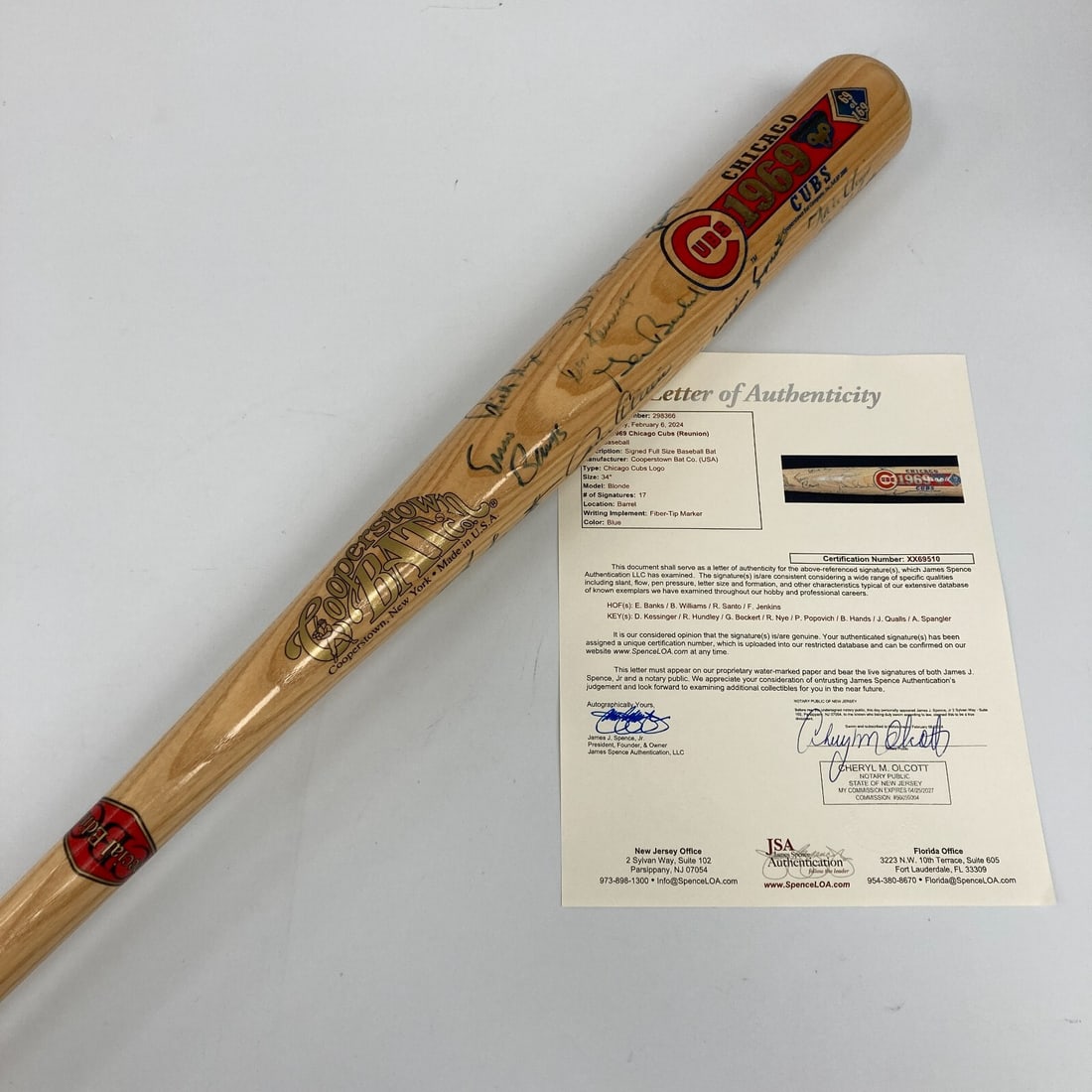 1969 Chicago Cubs Signed Bat 17 Autographs Ernie Banks JSA COA: 1969 Chicago Cubs Signed Bat 17 Autographs Ernie Banks JSA COA This original 1969 Chicago Cubs commemorative baseball bat is a must-have for any fan or collector. Measuring 34" long, this special edit