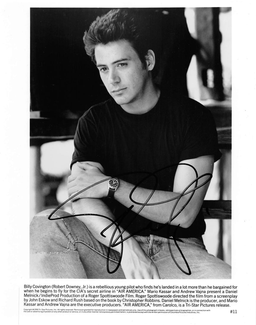 Robert Downey Jr. Signed Air America 8x10 Photo PSA/DNA Certified: Robert Downey Jr. Signed Air America 8x10 Photo PSA/DNA Certified This authentic 8x10 photograph features the signature of Robert Downey Jr. from the film Air America. The autograph has been verified 