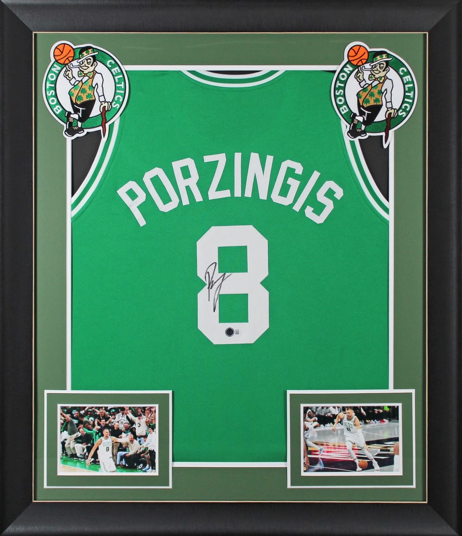 Framed Green Jersey Signed by Kristaps Porzingis BAS Witnessed: Framed Green Jersey Signed by Kristaps Porzingis BAS Witnessed Autographed green pro style framed jersey personally signed by Kristaps Porzingis of the Boston Celtics. It is an original item with Beck