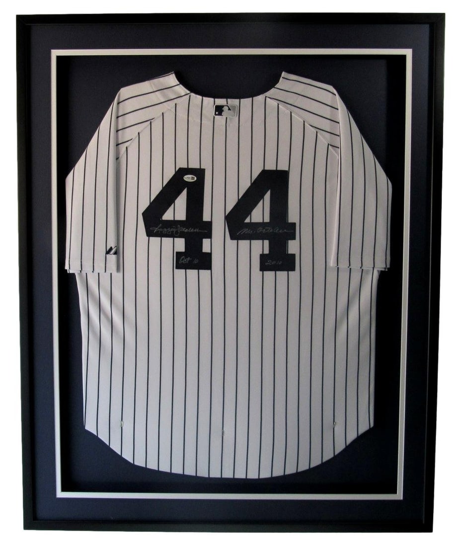 Framed Reggie Jackson Autographed Yankees Jersey With JSA Authentication: Framed Reggie Jackson Autographed Yankees Jersey With JSA Authentication This is a custom-framed New York Yankees jersey signed by Hall of Famer Reggie Jackson. The piece has been authenticated by Jam
