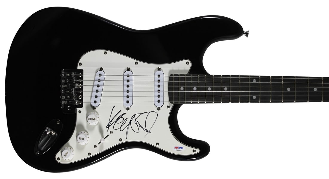 PSA Authenticated Kate Nash Signed Black Electric Guitar: PSA Authenticated Kate Nash Signed Black Electric Guitar Black electric guitar personally signed by Kate Nash. The item is described as original and comes with a PSA/DNA certification card and matchin