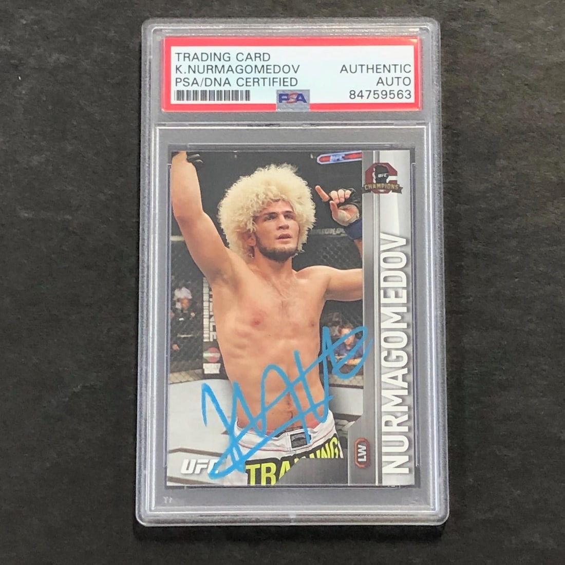 Khabib Nurmagomedov PSA authenticated signed 2015 Topps UFC #104 card: Khabib Nurmagomedov PSA authenticated signed 2015 Topps UFC #104 card This is a 2015 Topps UFC Champions #104 sports trading card featuring Khabib Nurmagomedov. The card is autographed by Khabib Nurma