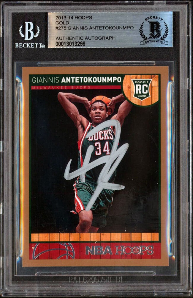 Giannis Antetokounmpo Autographed Hoops Gold Rookie Card Beckett Authenticated: Giannis Antetokounmpo Autographed Hoops Gold Rookie Card Beckett Authenticated This 2013-14 Hoops Gold #275 rookie card features a personal autograph from Giannis Antetokounmpo of the Milwaukee Bucks.