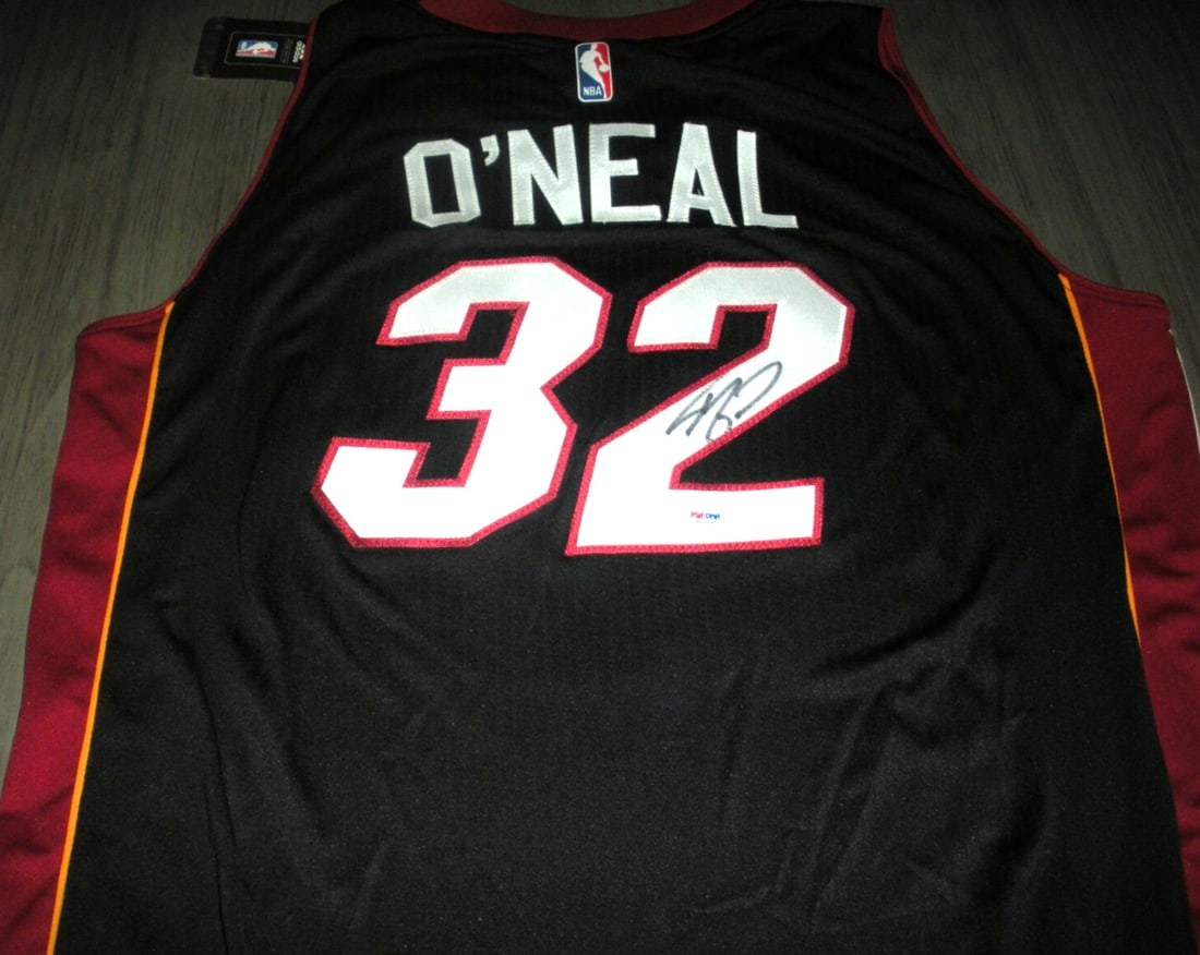 Shaquille O'Neal Miami Heat Signed Adidas Jersey with PSA/DNA COA: Shaquille O'Neal Miami Heat Signed Adidas Jersey with PSA/DNA COA This official licensed Adidas jersey is a must-have for any basketball fan and collector. It features the iconic Miami Heat colors and