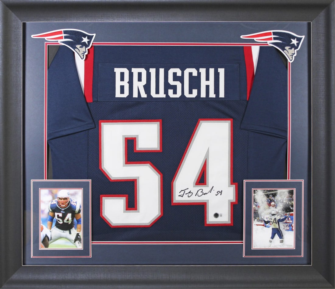 Framed Tedy Bruschi Signed Patriots Navy Jersey Beckett BAS Witnessed: Framed Tedy Bruschi Signed Patriots Navy Jersey Beckett BAS Witnessed Autographed Navy Blue Pro Style framed jersey personally signed by Tedy Bruschi of the New England Patriots. It is an original ite
