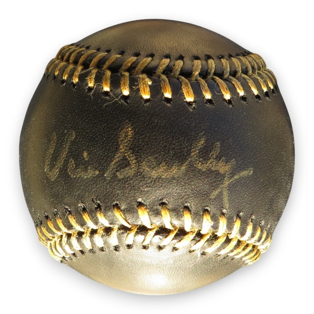 Beckett Authenticated Vin Scully Autograph on Black Dodgers Baseball: Beckett Authenticated Vin Scully Autograph on Black Dodgers Baseball This is an original autographed black baseball signed by Vin Scully. It is associated with the Los Angeles Dodgers and comes with B