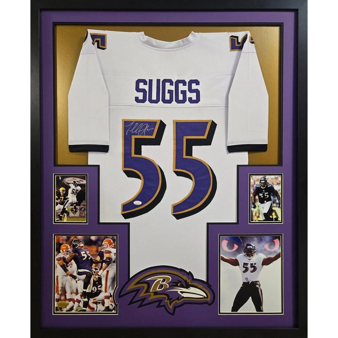 Framed Baltimore Ravens Jersey Signed by Terrell Suggs with JSA COA: Framed Baltimore Ravens Jersey Signed by Terrell Suggs with JSA COA This framed Baltimore Ravens jersey has been autographed by Terrell Suggs and is authenticated by JSA. The display features detailed