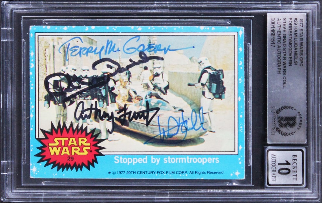 1977 Star Wars OPC #29 Card Signed by Hamill Daniels Forrest McGovern Gem Mint 10: 1977 Star Wars OPC #29 Card Signed by Hamill Daniels Forrest McGovern Gem Mint 10 This is a rare autographed 1977 Star Wars OPC #29 trading card, graded Gem Mint 10. The card features the signatures o
