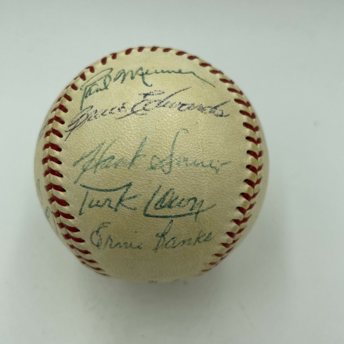 1953 Chicago Cubs Team Signed Baseball with Ernie Banks Pre Rookie Signature JSA: 1953 Chicago Cubs Team Signed Baseball with Ernie Banks Pre Rookie Signature JSA This is an original 1953 Chicago Cubs team-signed official National League baseball, notable as the earliest known pre-