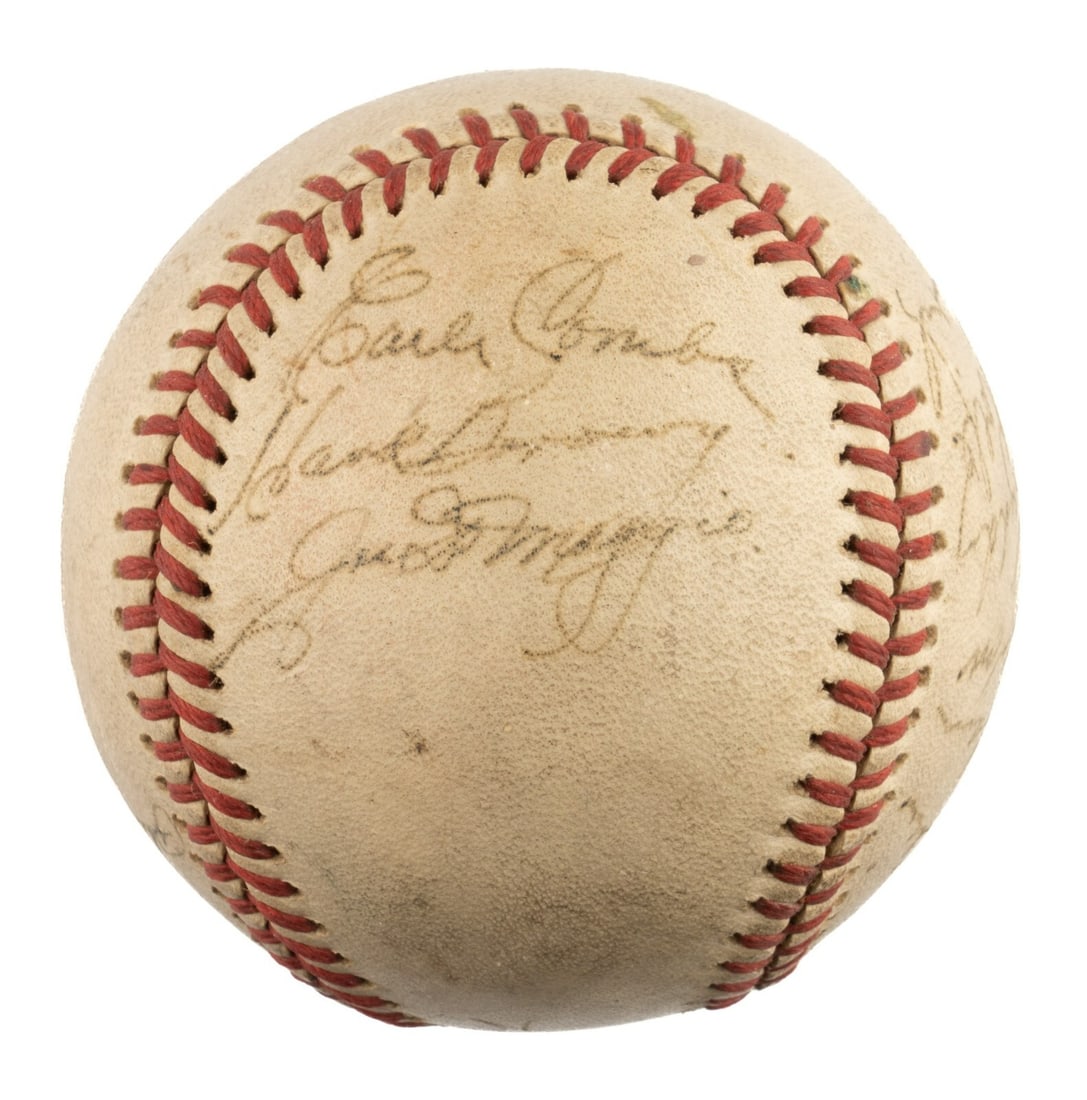 1942 New York Yankees Team Signed Baseball Joe DiMaggio PSA DNA COA: 1942 New York Yankees Team Signed Baseball Joe DiMaggio PSA DNA COA This is an official American League baseball signed in black ink by nineteen members of the legendary 1942 New York Yankees, includi