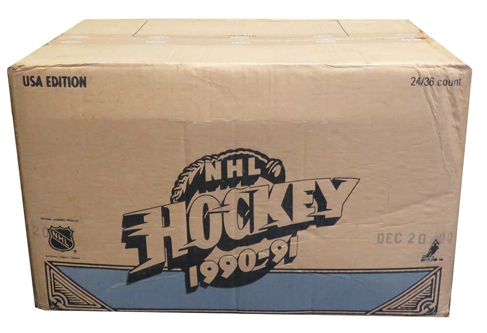 1990-91 Upper Deck NHL Hockey Low Series Sealed Case of 24 Boxes: 1990-91 Upper Deck NHL Hockey Low Series Sealed Case of 24 Boxes Discover a piece of hockey history with this Factory Sealed Case of 1990-91 Upper Deck Low Series hockey cards. This unopened case cont