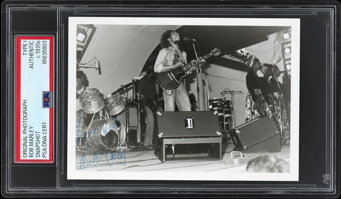 PSA DNA Authenticated Bob Marley Signed Original Concert Photo Love Rasta: PSA DNA Authenticated Bob Marley Signed Original Concert Photo Love Rasta This is an original Type 1 photograph from the 1970s featuring legendary Jamaican singer and songwriter Bob Marley. Captured d
