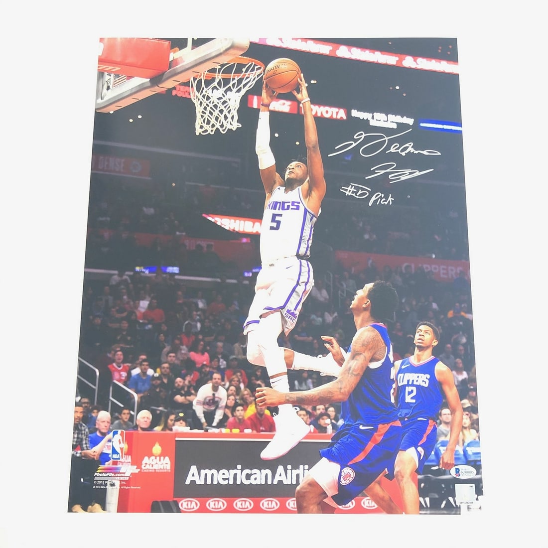 De'Aaron Fox Autographed 16x20 Photo BAS Authentication Sacramento Kings: De'Aaron Fox Autographed 16x20 Photo BAS Authentication Sacramento Kings Celebrate your love for basketball with this stunning, professionally printed 16x20 photograph featuring De'Aaron Fox of the Sa