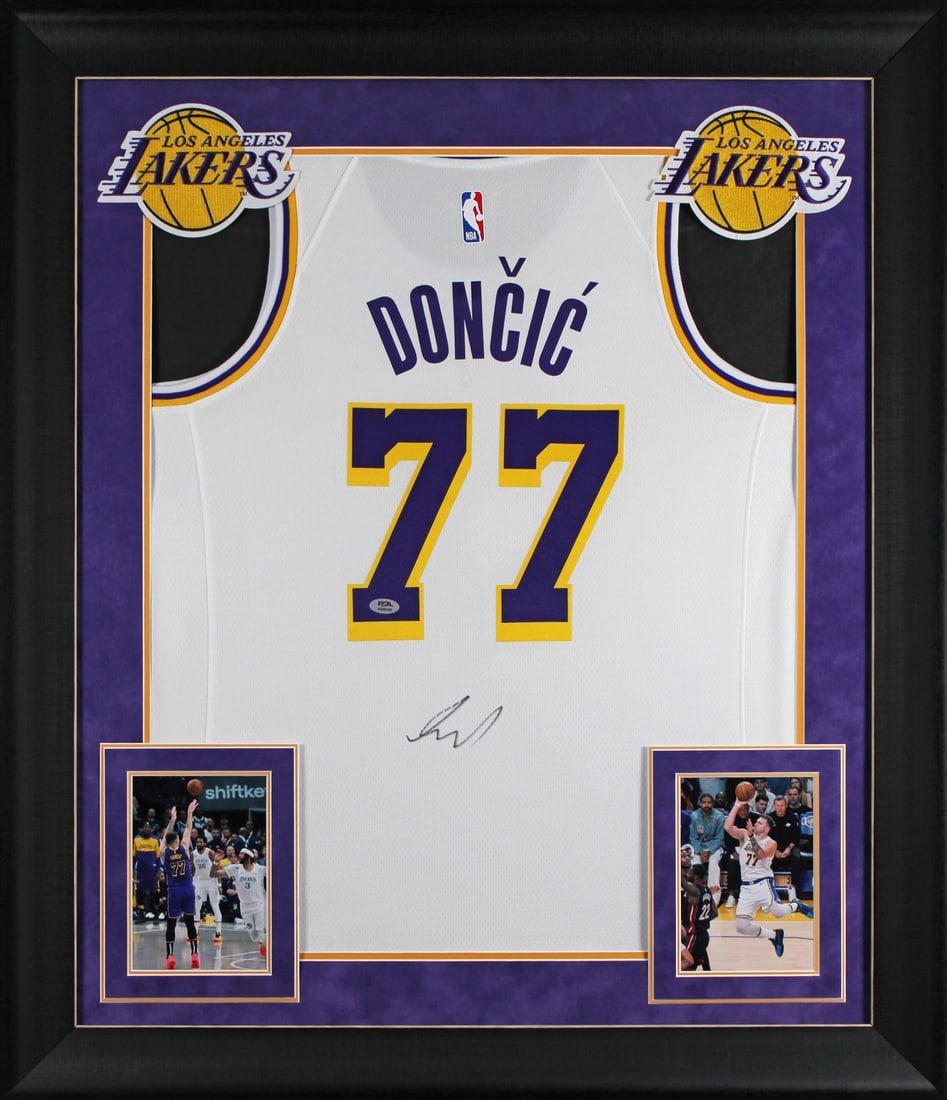 Framed Luka Doncic Lakers Nike Swingman jersey PSA DNA authenticated: Framed Luka Doncic Lakers Nike Swingman jersey PSA DNA authenticated This framed white Nike Swingman jersey has been personally signed by Luka Doncic of the Los Angeles Lakers. The autograph is authen