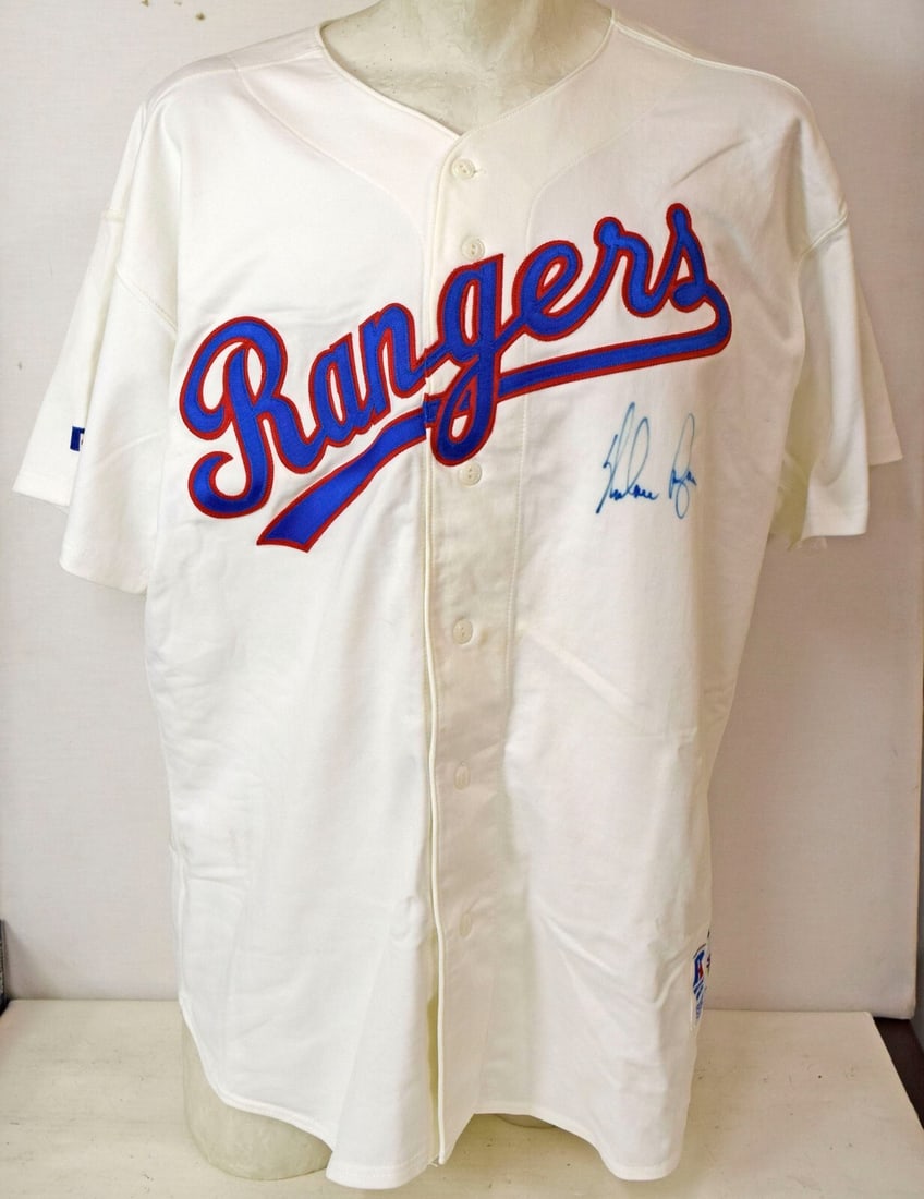 Nolan Ryan Signed Texas Rangers Vintage Russell Jersey JSA COA: Nolan Ryan Signed Texas Rangers Vintage Russell Jersey JSA COA This is an original vintage Russell game model jersey of Nolan Ryan, featuring his autograph authenticated by James Spence Authentication