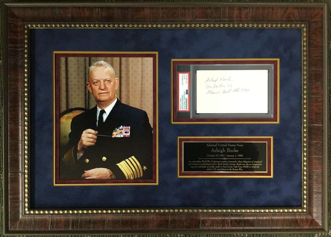 Framed Display of Admiral Arleigh Burke Signed Cut PSA Authenticated: Framed Display of Admiral Arleigh Burke Signed Cut PSA Authenticated This professionally framed display features a cut signature from the esteemed WWII Admiral Arleigh Burke, who passed in 1996. The s