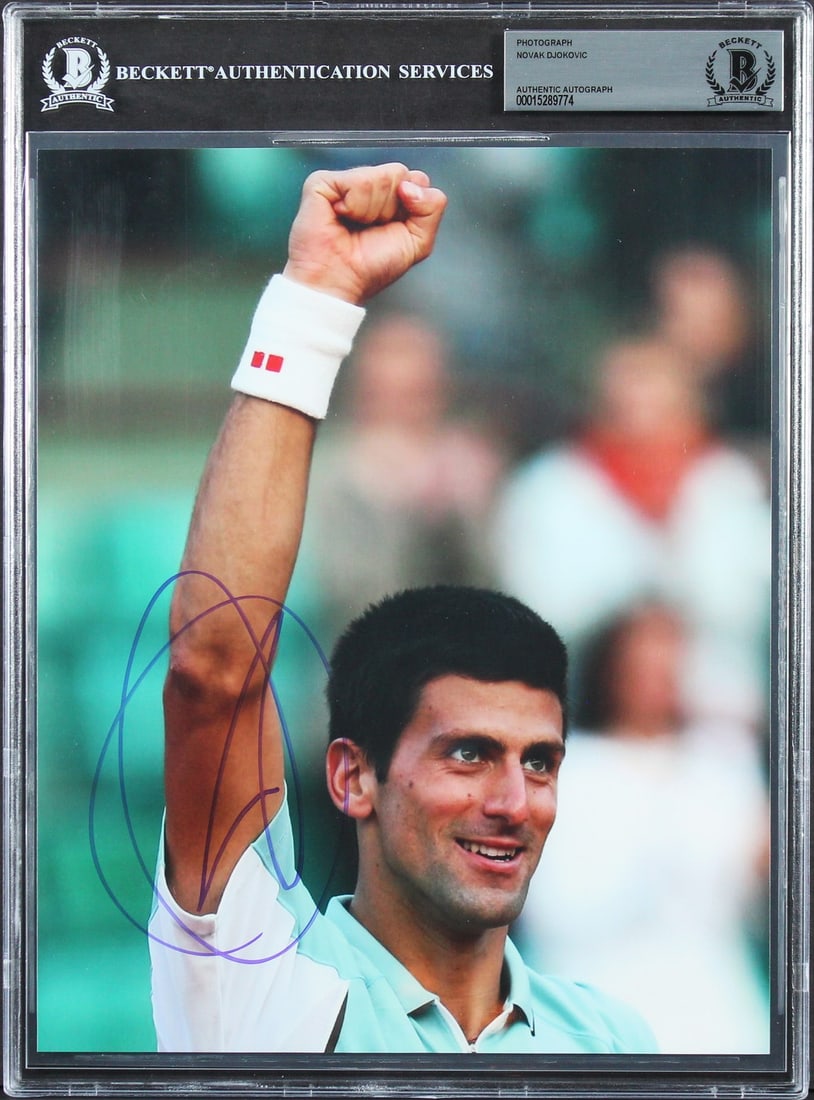 Novak Djokovic signed vertical 8x10 photo Beckett authenticated slabbed: Novak Djokovic signed vertical 8x10 photo Beckett authenticated slabbed Autographed vertical 8x10 photo personally signed by Novak Djokovic. The item is an original, pre-owned piece and comes slabbed 