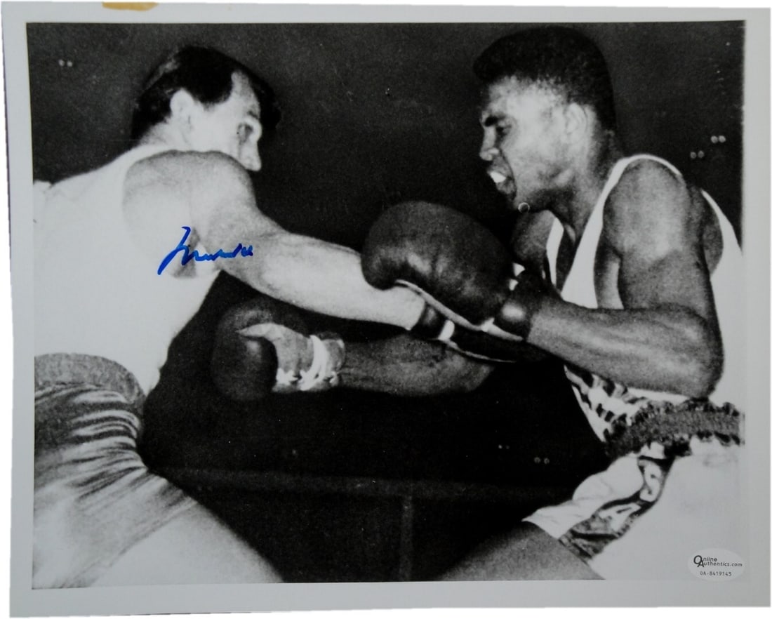 Muhammad Ali Hand Signed 8x10 Photo Authenticated by Online Authentics: Muhammad Ali Hand Signed 8x10 Photo Authenticated by Online Authentics This captivating 8x10 photo showcases the legendary Muhammad Ali, hand-signed by the boxing icon himself. This original piece com