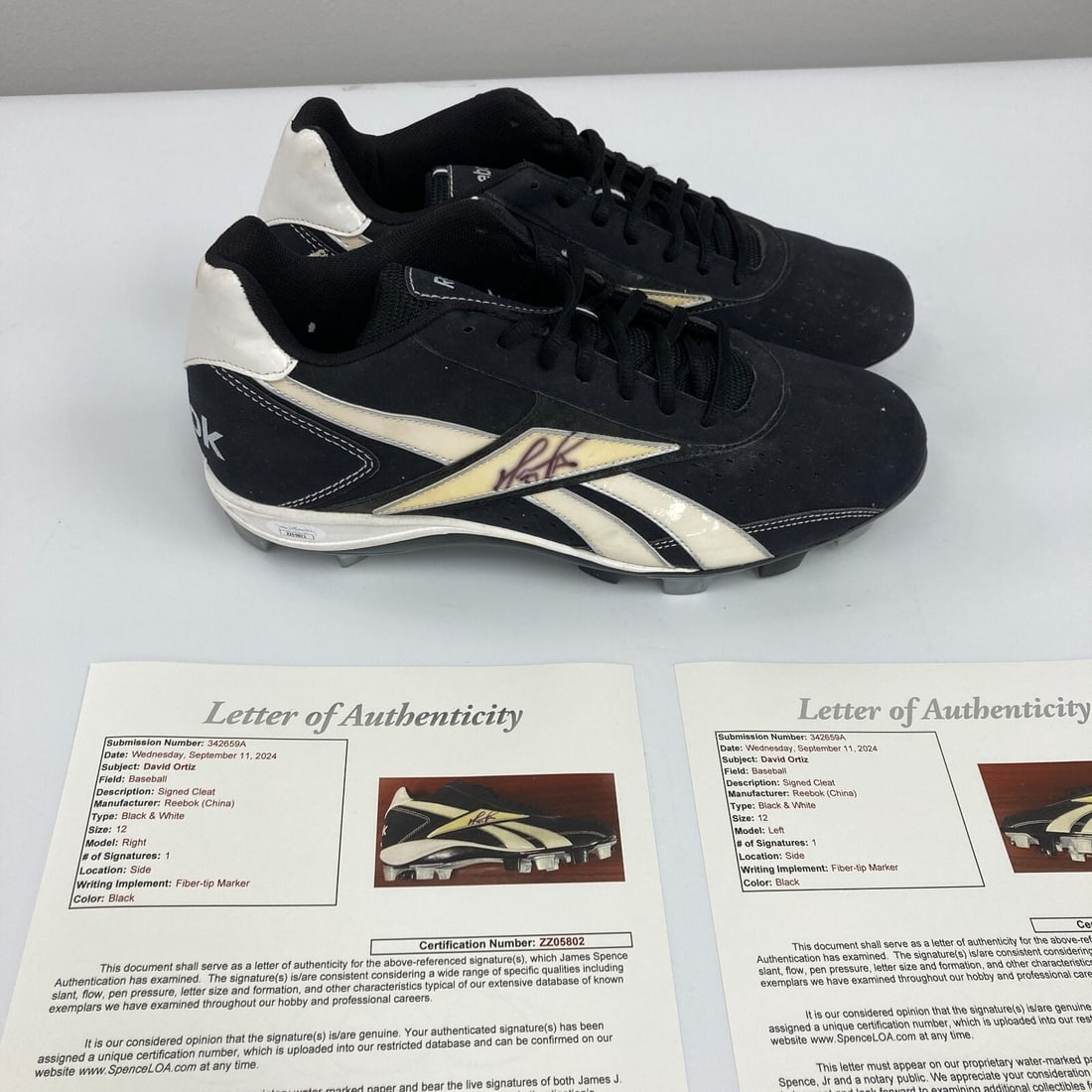 David Ortiz autographed Reebok game-issued cleats pair JSA COA size 12: David Ortiz autographed Reebok game-issued cleats pair JSA COA size 12 This is a pair of David Ortiz game-issued Reebok cleats, each signed by the legendary Boston Red Sox player. The cleats feature a
