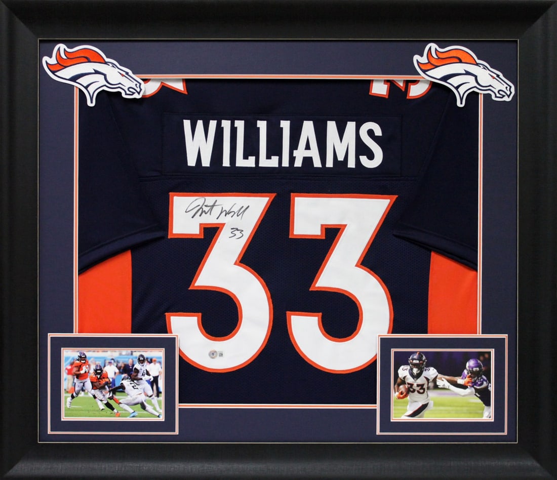 Javonte Williams Signed Framed Jersey Denver Broncos BAS Witnessed: Javonte Williams Signed Framed Jersey Denver Broncos BAS Witnessed Celebrate your love for the Denver Broncos with this authentic, signed navy blue pro-style framed jersey by Javonte Williams. This or