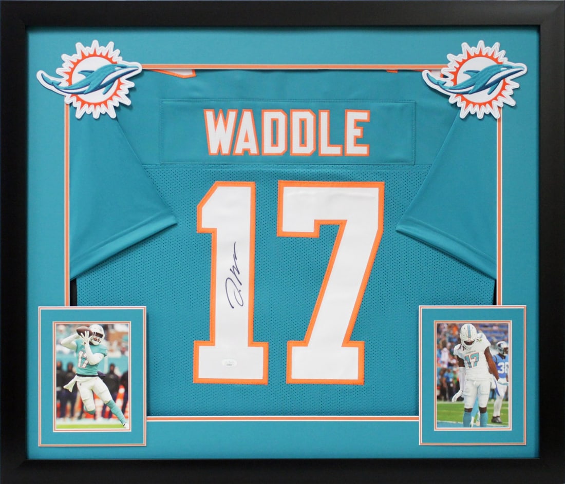 Framed Miami Dolphins Jaylen Waddle autographed teal pro style jersey JSA: Framed Miami Dolphins Jaylen Waddle autographed teal pro style jersey JSA This professionally framed teal pro style jersey features an authentic autograph from Jaylen Waddle of the Miami Dolphins. The