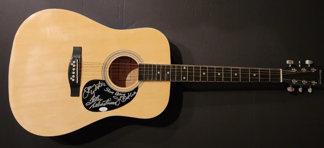 The Lovin' Spoonful Signed Acoustic Guitar with JSA Authentication: The Lovin' Spoonful Signed Acoustic Guitar with JSA Authentication This is an original autographed acoustic guitar by The Lovin' Spoonful, featuring the signatures of band members John Sebastian, Jerr