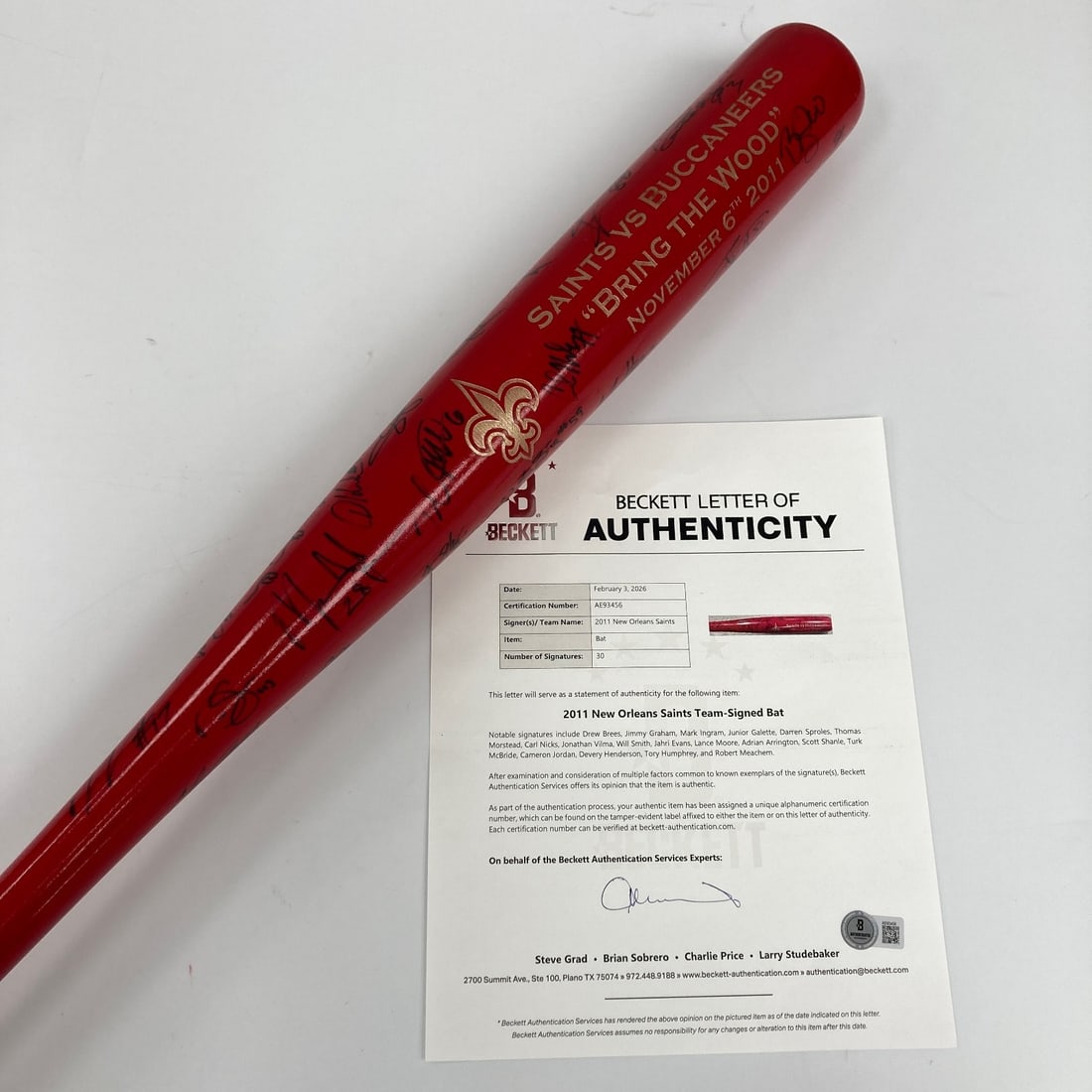 Commemorative Bat Signed by 2011 New Orleans Saints With 30 Autographs Beckett COA: Commemorative Bat Signed by 2011 New Orleans Saints With 30 Autographs Beckett COA This commemorative baseball bat celebrates the 2011 New Orleans Saints and features 30 black ink signatures from team
