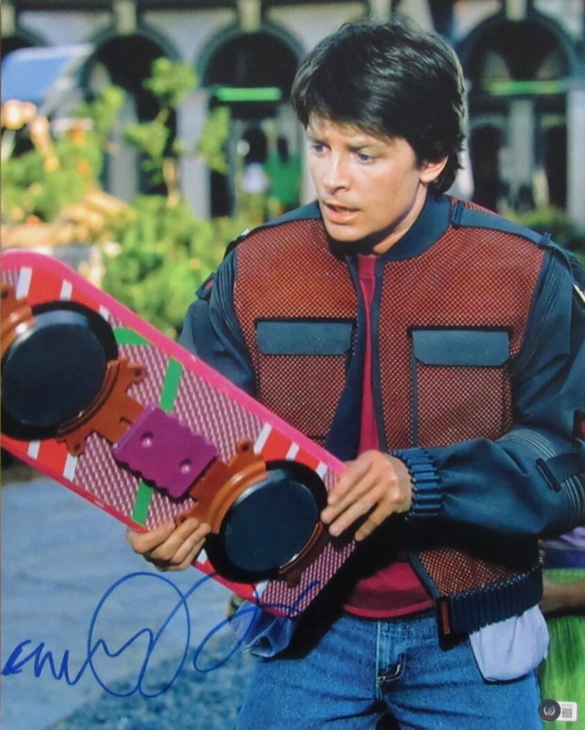 Michael J Fox Autographed 16x20 Back To The Future Photo BAS Certified: Michael J Fox Autographed 16x20 Back To The Future Photo BAS Certified This is an original autographed 16x20 photo of Michael J. Fox from the iconic film "Back To The Future." The autograph is authent