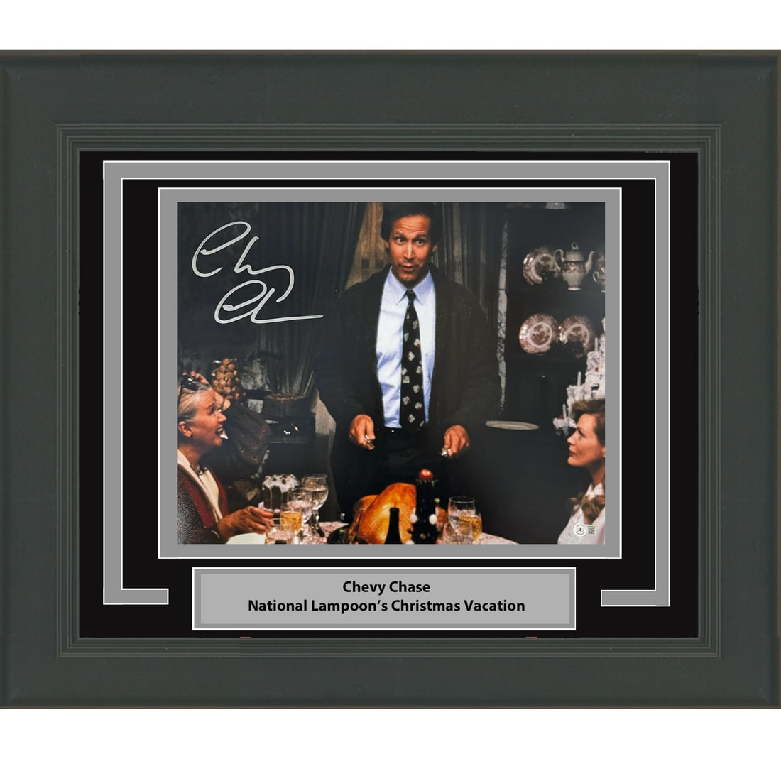 Framed Chevy Chase Christmas Vacation 16x20 Photo Signed BAS COA: Framed Chevy Chase Christmas Vacation 16x20 Photo Signed BAS COA This professionally framed and matted 16x20 photo of Chevy Chase from Christmas Vacation features his authentic autograph, verified by 