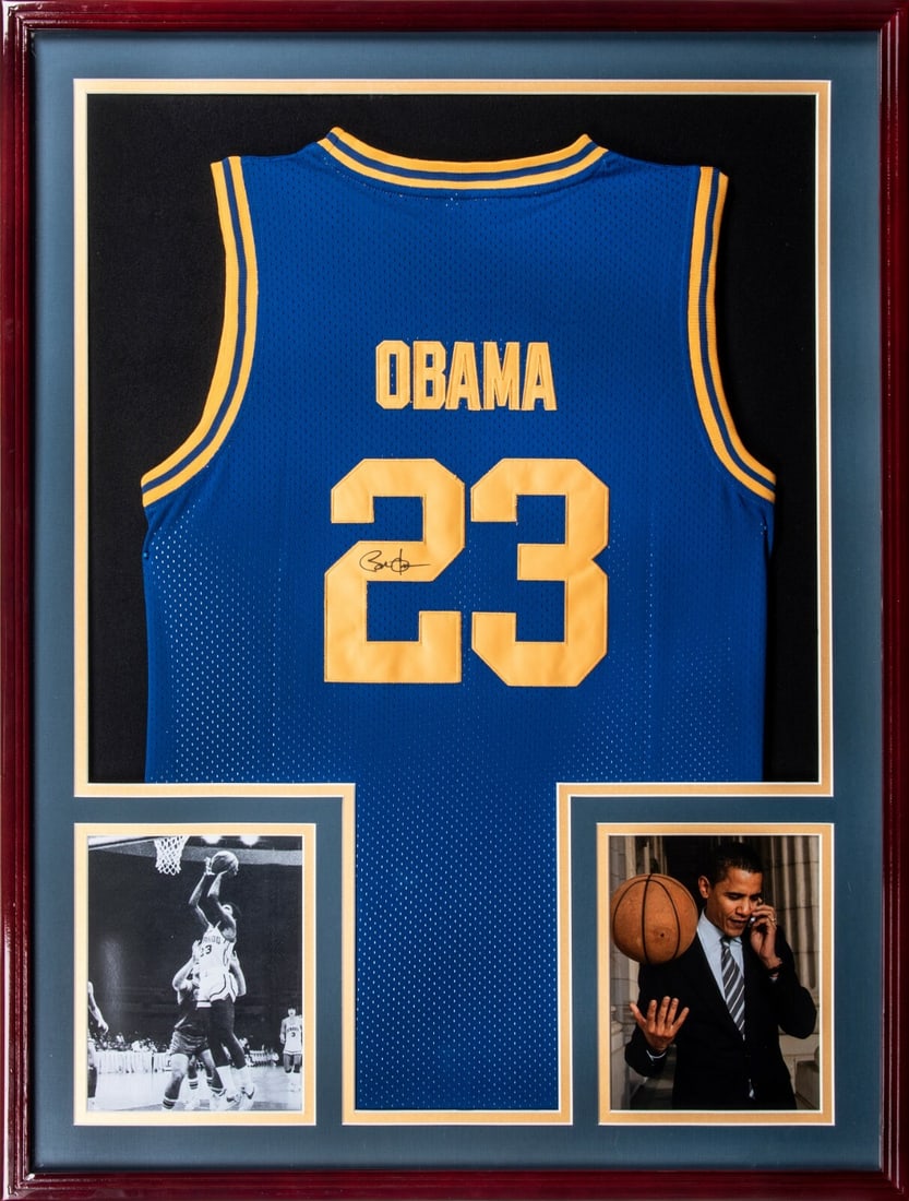 Framed Punahou Basketball Jersey Signed by Barack Obama Beckett Authenticated: Framed Punahou Basketball Jersey Signed by Barack Obama Beckett Authenticated This framed display features a Punahou High School basketball jersey signed by President Barack Obama. The blue mesh jerse