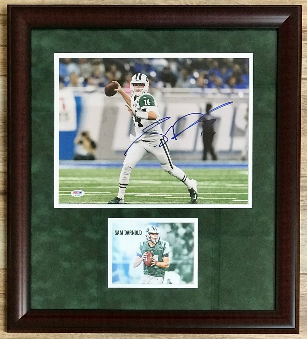 Sam Darnold Signed Framed Photo 11x14 New York Jets PSA Authenticated: Sam Darnold Signed Framed Photo 11x14 New York Jets PSA Authenticated This stunning display features a professionally framed 11x14 color photo of Sam Darnold, the quarterback for the New York Jets, pr