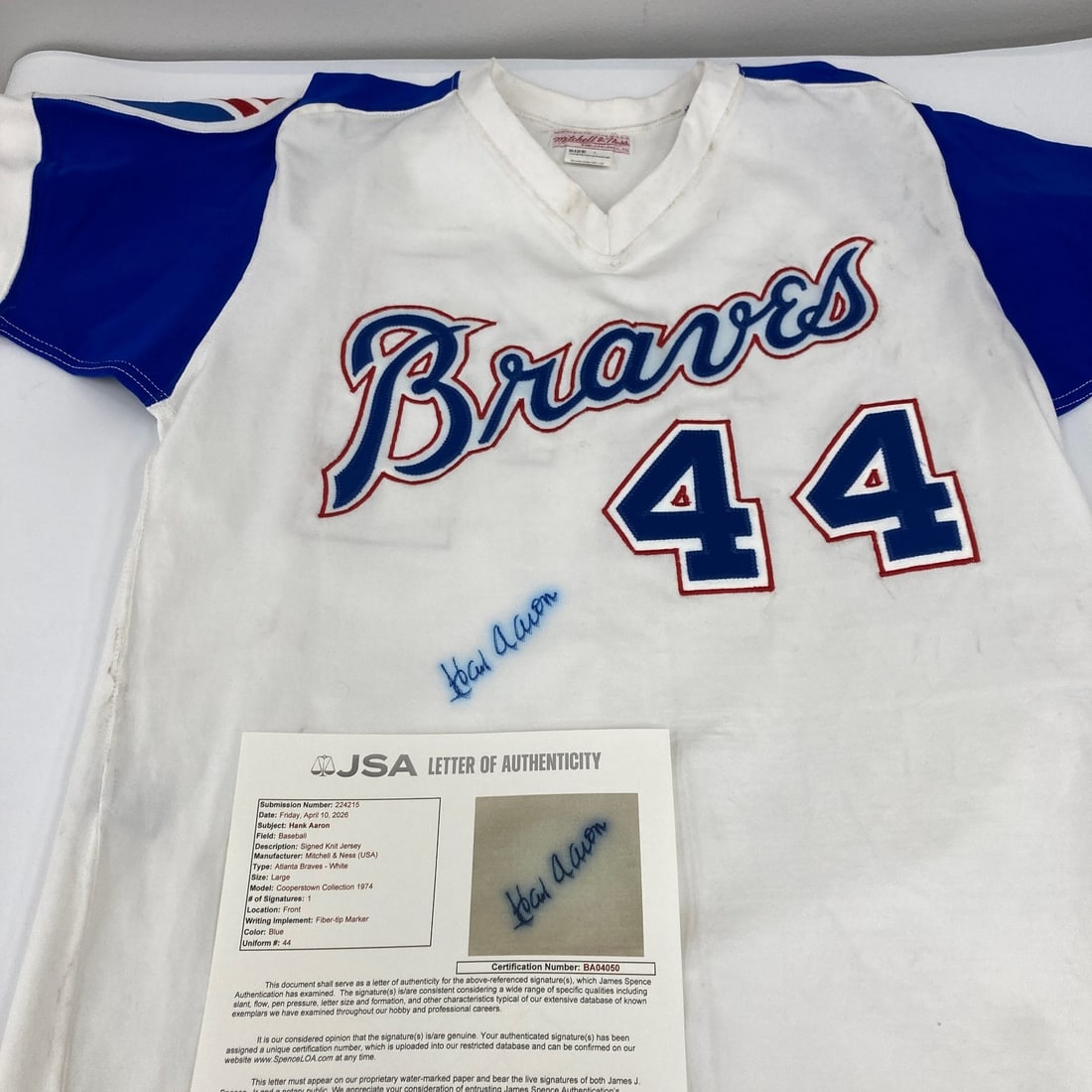 Hank Aaron autographed 1974 Mitchell Ness Braves jersey JSA COA: Hank Aaron autographed 1974 Mitchell Ness Braves jersey JSA COA This is an authentic 1974 Mitchell & Ness Atlanta Braves jersey, signed by legendary baseball player Hank Aaron. The jersey is accompani