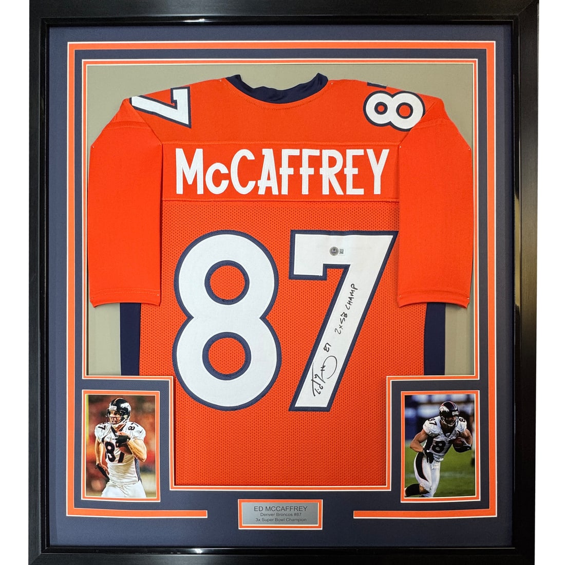 Ed McCaffrey Signed Orange Jersey Framed Display 35x39 Beckett Authenticated: Ed McCaffrey Signed Orange Jersey Framed Display 35x39 Beckett Authenticated This professionally framed and matted orange jersey features the autograph of Ed McCaffrey, commemorating his achievement a