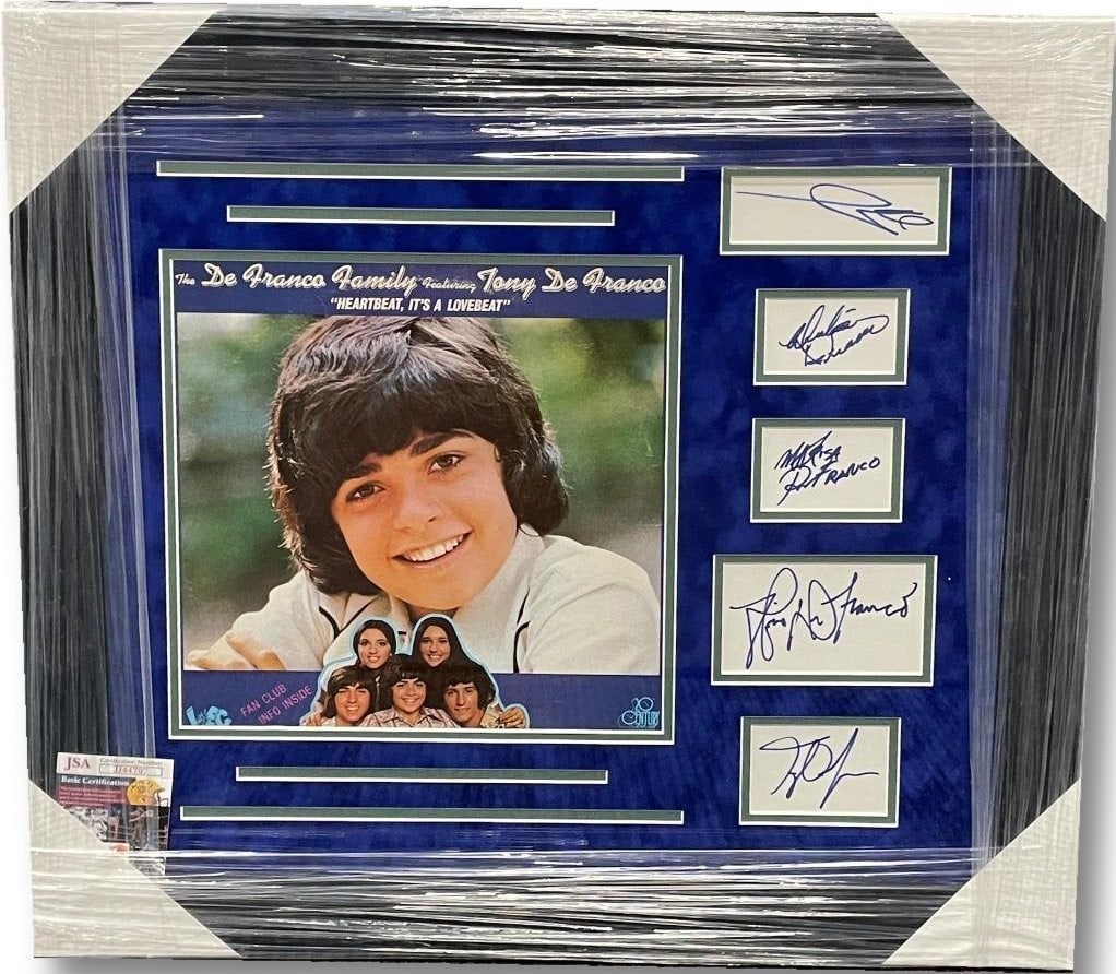 The DeFranco Family Signed Framed LP Collage JSA Authenticated: The DeFranco Family Signed Framed LP Collage JSA Authenticated This unique piece features a beautifully framed collage of The DeFranco Family, showcasing five authentic signatures from Tony DeFranco, 
