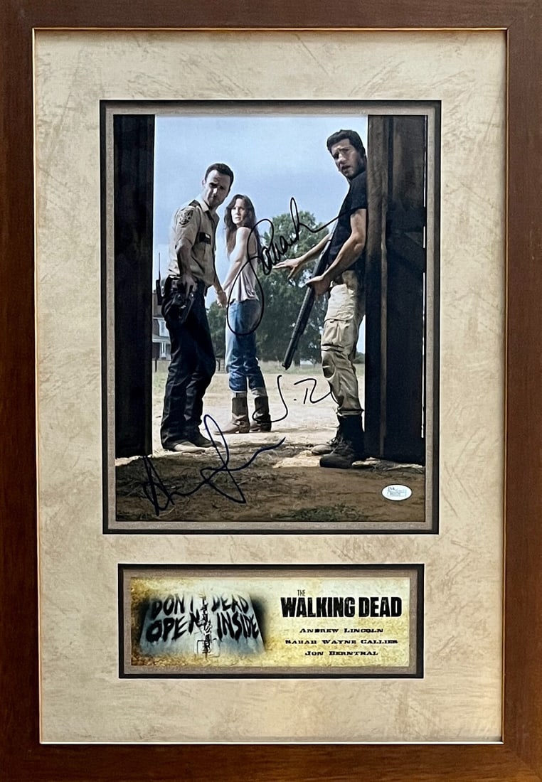 The Walking Dead Signed 11x14 Photo Custom Framed by Bernthal Lincoln Callies JSA: The Walking Dead Signed 11x14 Photo Custom Framed by Bernthal Lincoln Callies JSA This custom framed display features a signed 11x14 photo from Series 1 of the acclaimed TV show The Walking Dead. The 