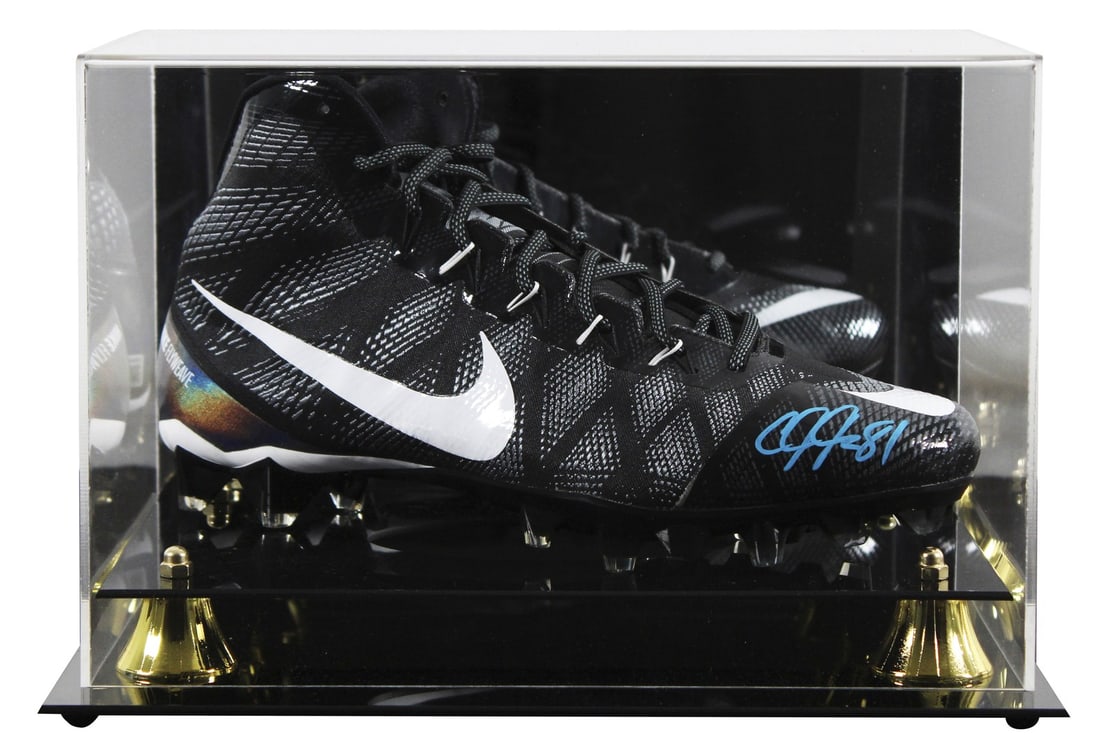 Calvin Johnson Signed Football Cleat with Beckett Authentication: Calvin Johnson Signed Football Cleat with Beckett Authentication This autographed Calvin Johnson Signature Series right football cleat comes with a UV mirrored back acrylic display case. Personally si