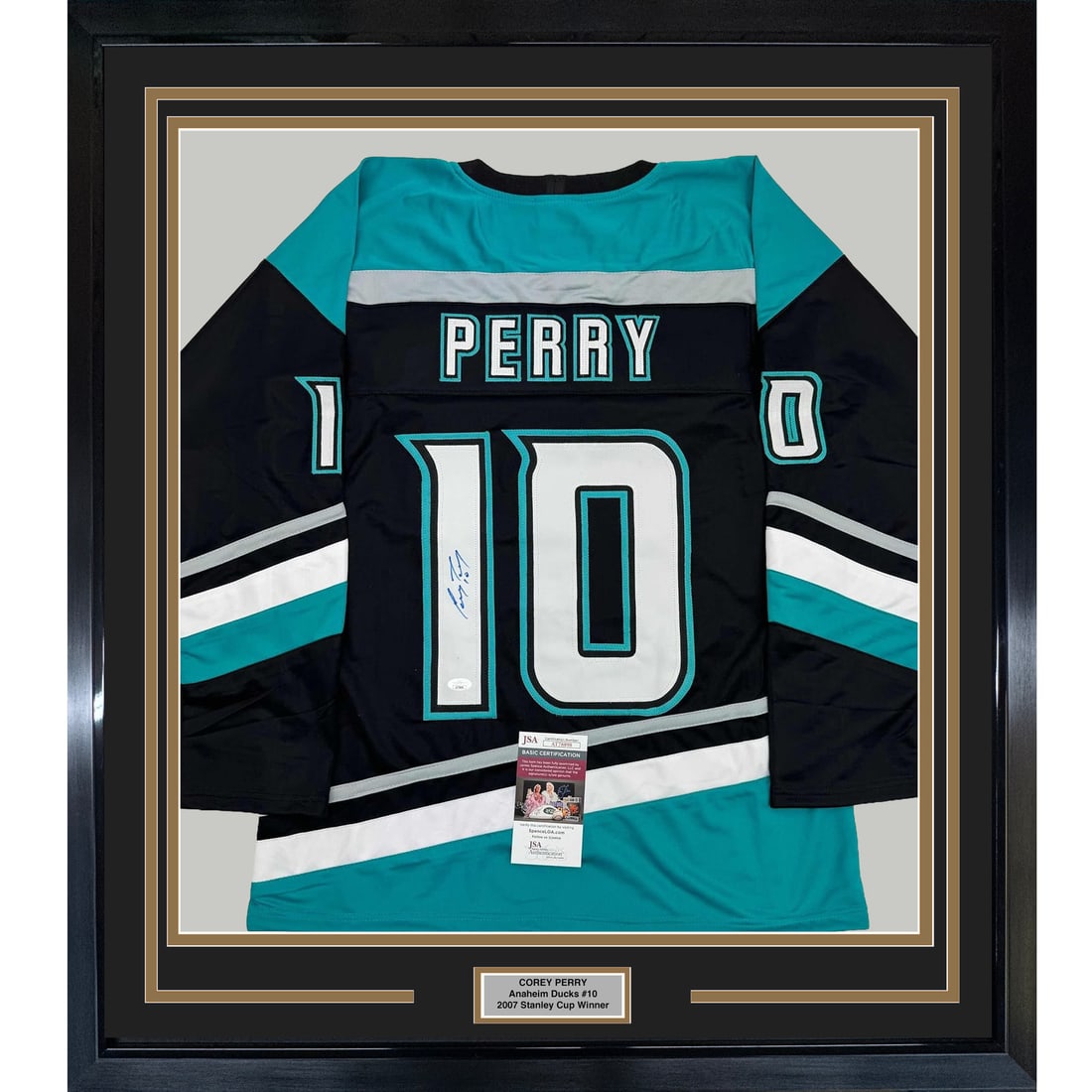 Framed Corey Perry Autographed Anaheim Ducks Retro Jersey JSA COA 35x39: Framed Corey Perry Autographed Anaheim Ducks Retro Jersey JSA COA 35x39 This professionally framed and matted autographed Corey Perry Anaheim Ducks black retro jersey is a stunning addition to any spo
