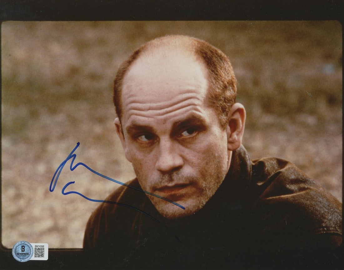 John Malkovich Signed 8x10 Photo In The Line Of Fire BAS Authentication: John Malkovich Signed 8x10 Photo In The Line Of Fire BAS Authentication This authentic 8x10 photograph features John Malkovich, personally signed by the acclaimed actor from the film 'In The Line Of F