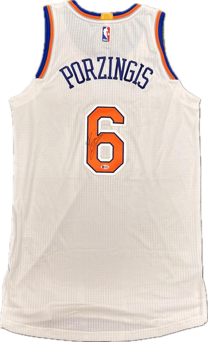 Beckett Signed Kristaps Porzingis Knicks Basketball Jersey: Beckett Signed Kristaps Porzingis Knicks Basketball Jersey This is a stitched New York Knicks jersey autographed by Kristaps Porzingis. The autograph has been authenticated by Beckett Authentication S