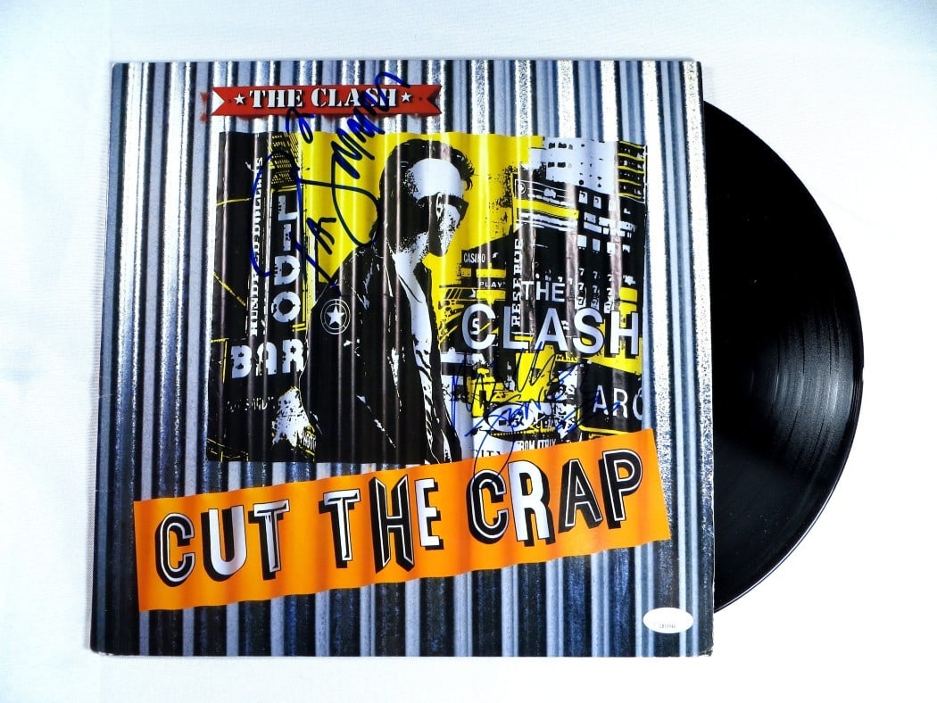 Mick Jones Paul Simonon Signed Album Cover The Clash JSA Authenticated: Mick Jones Paul Simonon Signed Album Cover The Clash JSA Authenticated This is an original album cover from The Clash, featuring dual autographs from band members Mick Jones and Paul Simonon. The auto