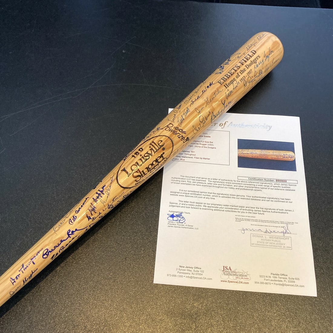 Brooklyn LA Dodgers Multi Signed Bat 90+ Sigs Sandy Koufax JSA COA: Brooklyn LA Dodgers Multi Signed Bat 90+ Sigs Sandy Koufax JSA COA This extraordinary Louisville Slugger Ebbets Field Commemorative bat is a rare collector's item featuring over 90 signatures from for