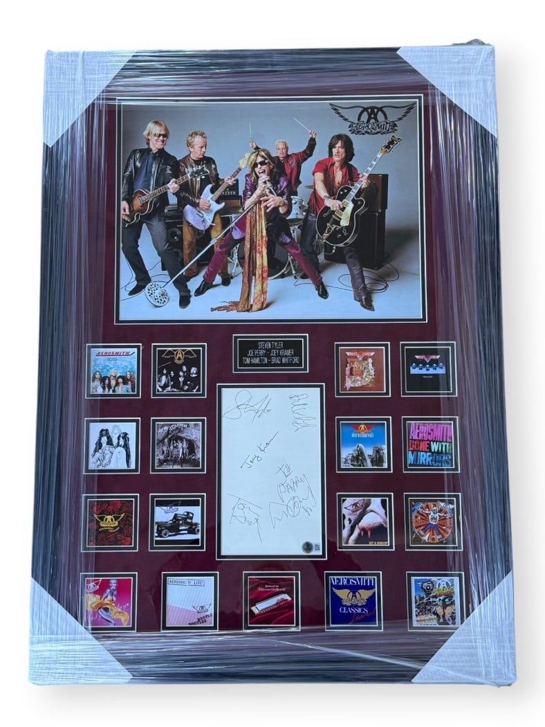 Framed Aerosmith Band Signed Cut Display Beckett Authenticated: Framed Aerosmith Band Signed Cut Display Beckett Authenticated This framed display features original autographs from all five members of Aerosmith: Steven Tyler, Joe Perry, Joey Kramer, Tom Hamilton, 
