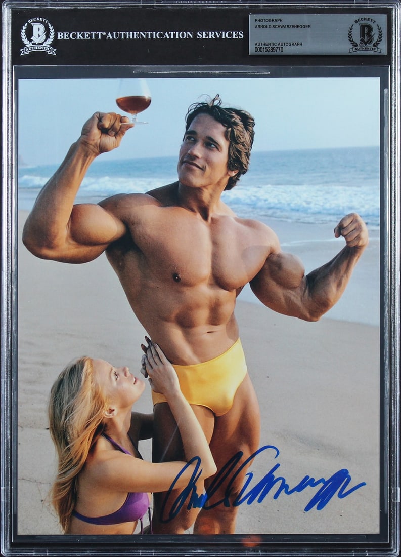 Beckett Slabbed Arnold Schwarzenegger 8x10 Signed Mr Olympia Photo: Beckett Slabbed Arnold Schwarzenegger 8x10 Signed Mr Olympia Photo This 8x10 photograph features the authentic signature of Arnold Schwarzenegger from his Mr. Olympia era. The photo has been personall