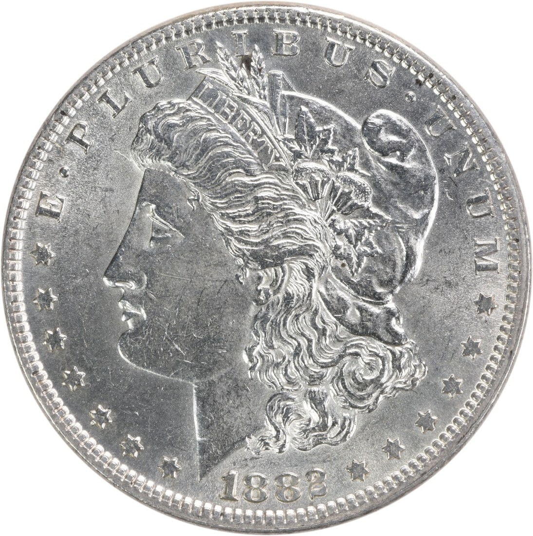 1882 Uncirculated Morgan Dollar Silver Coin Brilliant Uncertified Example: 1882 Uncirculated Morgan Dollar Silver Coin Brilliant Uncertified Example This 1882 Morgan Silver Dollar is an uncirculated coin with a brilliant uncirculated (BU) grade. Struck in silver with no mint
