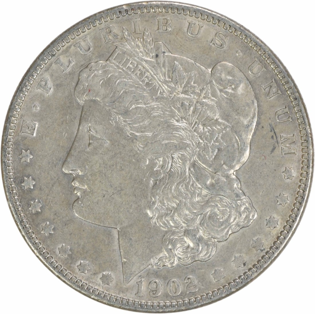 1902 Morgan Silver Dollar AU Uncertified 90% Silver Coin: 1902 Morgan Silver Dollar AU Uncertified 90% Silver Coin This 1902 Morgan Silver Dollar showcases a beautiful design by George T. Morgan and is in AU (About Uncirculated) condition, meaning it has bee